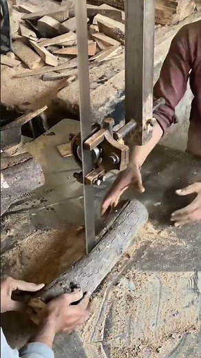 Cutting a wooden beam precisely using a power saw, creating smooth and accurate edges #construction