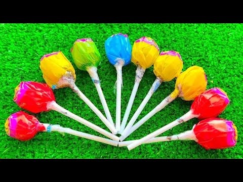 Satisfying video Asmr lollipops candy and chocolate gummy candy unboxing video