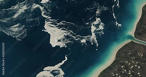 Very high-altitude overflight aerial of sea ice in Foxe Basin, Nunavut, Canada. Clip loops and is reversible. Elements of this image furnished by NASA