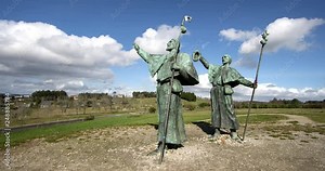 Statue of Pilgrims on Monte do Gozo in Santiago de Compostela, Spain. Timelapse 4K video. Way of St. James, pilgrimage
