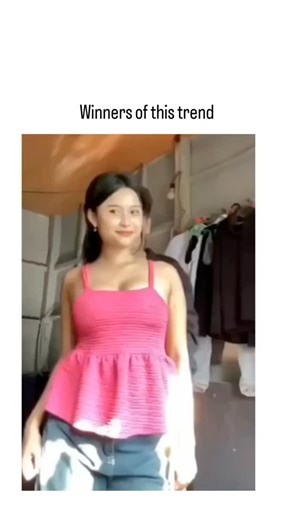 nexon.marco on Instagram: "The post shares a 15-second video of a couple in a wardrobe area awkwardly dancing and lifting their tops to expose midriffs, captioned "Winners of this trend " to sarcastically highlight their cringeworthy participation in a viral couples challenge. Part of a recent X trend involving humorous, suggestive flexing or posing by pairs, the clip has amassed over 930,000 views, 6,000 likes, and 248 replies, reflecting its rapid spread and entertainment value. User responses