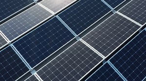 Premium stock video - Installed solar panel array, birdseye aerial view