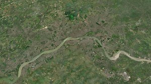 Satellite Kolkata map background loop. Spinning around India city air footage. Seamless panorama rotating over downtown backdrop.