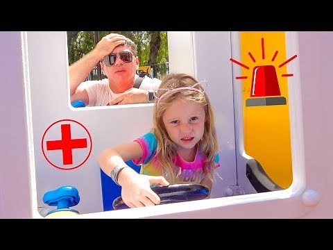 Stacy and dad have fun in the amusement park