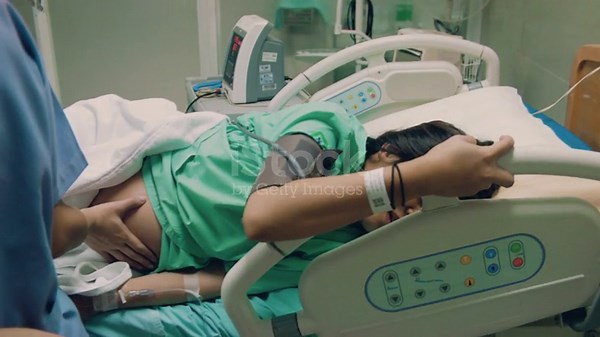 Pregnant African American woman girl car driver automobile auto belly talk mobile phone female call pregnancy painful ill health medicine unhealthy future mother ache smartphone vehicle sick transport stock video 2181624195