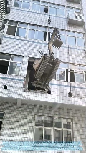 Reaching the Interior: How a Crane Lifts an Excavator for Precision Demolition