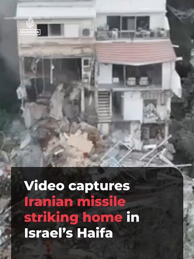 Video captured the moment of a direct hit by an Iranian missile on a residential building in Israel’s Haifa. . Multiple injuries were reported and some people are feared trapped under the rubble of the partially collapsed structure. #news