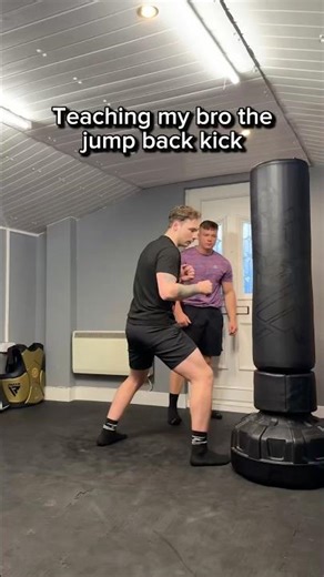 Teaching my bro the jump back kick…