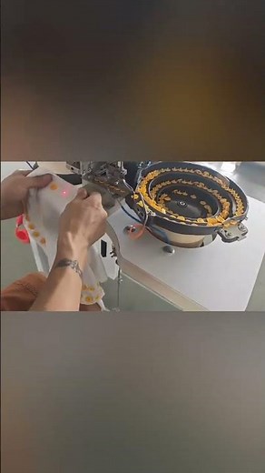 garment factory production video: automatic snap button attaching & Sewing machine do T5 snap button