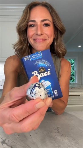 My HOMEMADE BACI! Have you ever had Baci? If not, you are missing out! 🍫✨ Truth is I bought all the ingredients to try and make homemade Snickers, but my heart wasn't into it. I started to think about the chocolate I loved as a kid and knew I had to try to replicate them. Your new favorite chocolate! Makes 18 Ingredients: • ½ cup hazelnut spread • ½ cup almond flour • ¼ cup chopped hazelnuts • 18 ounces dark chocolate chips • 1 tbsp coconut oil • 18 hazelnuts Instructions: • To a medium sized b