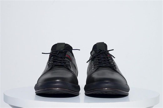 Materials Upper: LeatherLining: LeatherSole : Durable and lightweight TPU out sole provides enhanced underfoot comfort, while deep rubber flex grooves ensure a more natural feel. Hoxton Green Leather Men Sneaker: Elevate Your Style with Craftsmanship Elasticized Ankle for Effortless Style: To add a touch of distinctiveness, the ankle portion of the shoe is expertly crafted from elastic fabric, allowing for a seamless slip-on experience. This design element ensures both ease of wear and a stylish