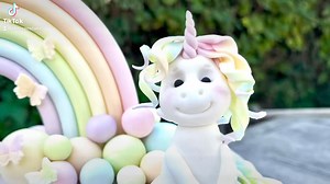 How to create this cute little unicorn cake topper with a pastel, curly mane! I used Saracino modelling paste for this topper. #unicorn #unicorncake #unicornparty #unicornmagic #unicornlove #pastel #pastelcolors #pastelcolours #pastelrainbow #tutorial #videotutorial | Shereen's Cakes & Bakes