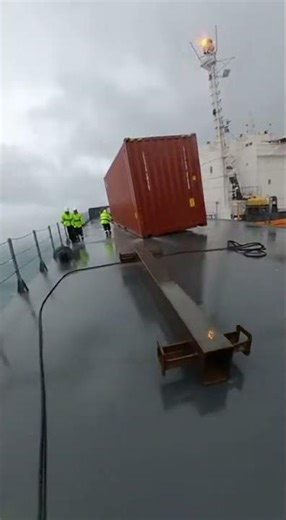Chaos at Sea: Containers Tumble Amidst Storms! 🚢🌊 #Ship #Storm #Cargo