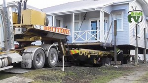 The Brittons have jacked a house up off its foundations, to move it forward approximately 4-5 meters. The video shows how this is done with 2 house moving rigs. | Kiwi TV 2017 Limited