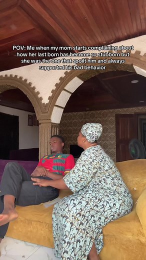 Engaging Conversation on a Yellow Couch