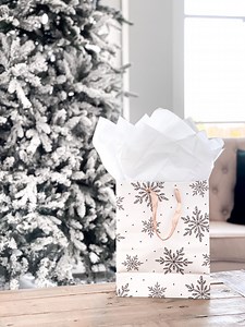 Growing up, I remember thinking it was so funny that my grandma (whom I called Oma) would save wrapping paper. She would open her presents so carefully, fold the paper up very nicely, and then go around the room picking up everyone else’s wrapping paper to salvage for next year’s gifts. And while those memories still bring back such a special memory that also makes me chuckle a little bit, I’ve realized that genetics is a funny thing. Call me crazy if you want, but I love to reuse tissue paper (