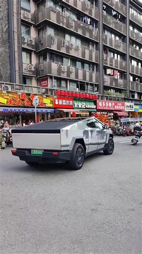 A wealthy young man drove his Tesla Cybertruck with his girlfriend and the stainless steel-like body