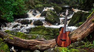 1.3K views · 109 reactions | The X30 is a guitar for all seasons. Building with carbon fibre allows you to create designs and features that bring more comfort to the player such as rib and arm bevels and cutaway heel access to the high frets. The X30 changes everything you thought you knew about jumbo guitars. | Emerald Guitars | Facebook