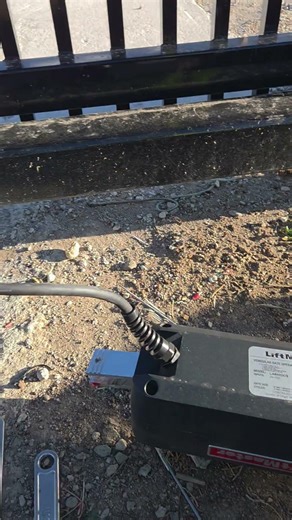 replacing a damaged actuator after car rams gate.