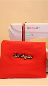 Curious about how this bold 3D embroidery came to life?Our PooLin machine high-contrast threads = perfection. Nothing says bold like red & gold. This retro "Los Angeles" design stitched in 3D brings color and character to your everyday look. #embroidery #embroiderymachine #embroiderydesign #embroideryart #embroiderylove #diy #Craft #foryou | Poolin Embroidery Sewing Machine
