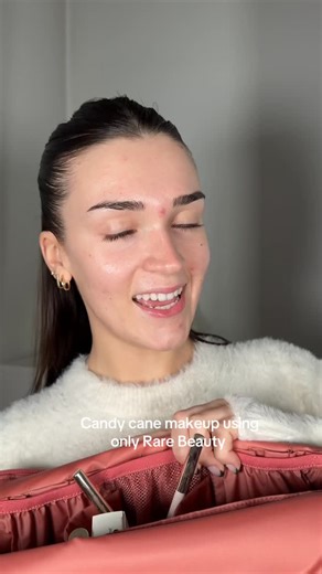 Madison on Instagram: "Candy cane makeup using only @rarebeauty ❤️🤍 #rarebeauty #rareroutine #candycanemakeup #makeuptutorial #beauty"
