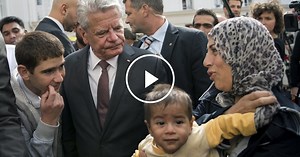German Leaders Visit Refugee Shelter