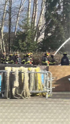 Firefighters spraying at the Seattle Fire Department Training Center on Myers Way S