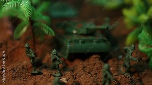 Rack focus, miniature model tanks and soldiers on display
