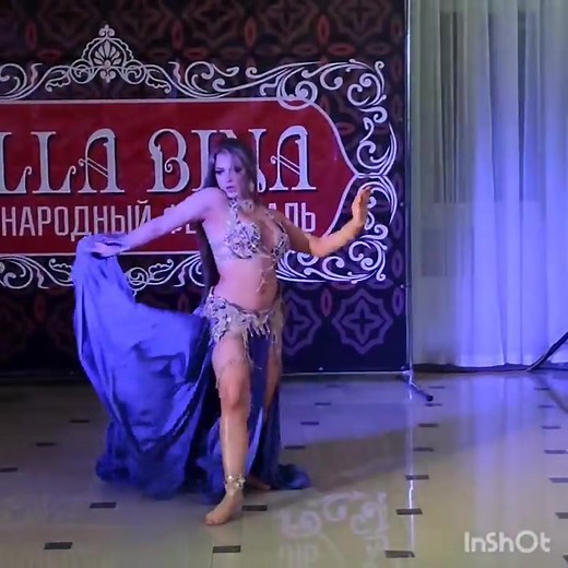 Amazing belly dancer Iren. Mesmerizing Dancer - A true master of belly dance, this captivating artist effortlessly embraces the elegance of Arabic dance and the mesmerizing Shakira-style moves. Their performances transport you to a world of enchantment, where rhythmic shimmy, enticing belly rolls, and magnetic belly flutters become an ethereal dance of beauty and grace. From musically belly dance videos to captivating belly dance TikTok content, their passion shines through, inspiring both begin