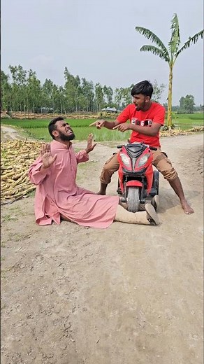 He lifted his small bike between the boy's legs.