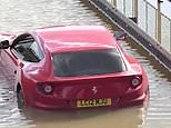 Ferrari floating on the A406 'river' leaving driver furious