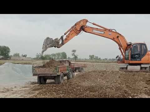 Excavator bucket falls off loading truck recovering