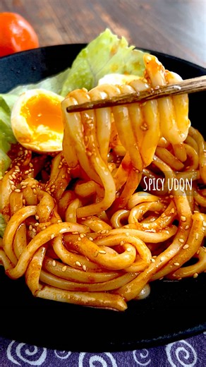 Spicy Udon — Simple, Bold & Comforting 🌶️🍜 Chewy udon coated in a sweet-savory spicy sauce, topped with a jammy egg and nutty sesame. Quick, addictive, and perfect for busy days. ┈┈┈┈┈ 𓎩 𓌉◯𓇋 𓌉◯𓇋 𓎩 ┈┈┈┈┈ Ingredients 〈Sauce〉 Sesame oil … 1 tbsp Soy sauce … 1 tbsp Apple cider vinegar … 1 tsp Garlic … 1 clove (grated) Sugar … 1 tbsp Gochujang … 1 tbsp Udon noodles … 1 pack Egg … 1 (boiled for 6½ minutes) White sesame seeds … as needed How to Make ① Mix all sauce ingredients in a bowl. ② Add 