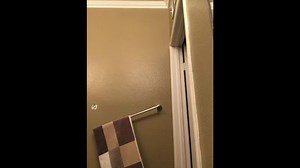 Guy in towel falls off pull-up bar