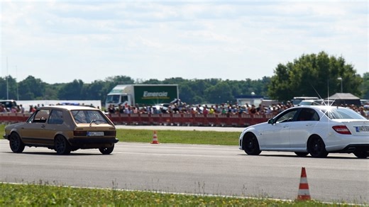 VW Golf 1 challenges Mercedes C63 on the strip