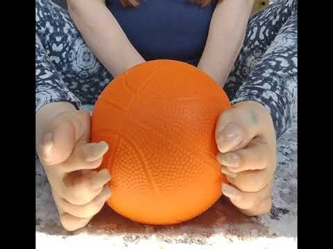 Long nails scratching ball.