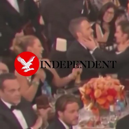 Ryan Reynolds and Andrew Garfield kisses at the Golden Globes