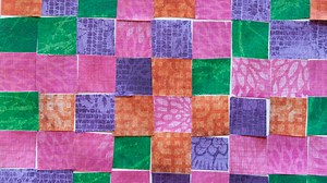 Think beyond fabric and create a quilt square using paper and glue!...
