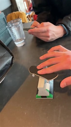 Lil clip with the Lego obstacle #fingerboard #fingerboarding #lego #kickflip #viralshorts #fyp