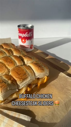 These are sure to slide into your regular appetizer rotation. Use our Spicy Buffalo-Style Cream of Chicken Soup to create game-day ready Buffalo Chicken Sliders to bring to your next viewing party. 1 onion, sliced 1 lb. shaved chicken breasts 1 can Campbell’s® Condensed Spicy Buffalo-Style Cream of Chicken Soup 1 pkg. Pepperidge Farm® Hearty White Dinner Rolls 6 slices provolone cheese 2 tbsp. butter, melted ½ tsp. dried parsley Heat oven to 350°F. Cook onions and chicken, then mix with soup. La