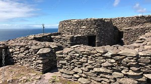Collection of beehive huts found on the Slea head, Dingle penninsula, in Ireland.