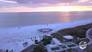It's the iconic drum circle from Siesta Beach on a comfortable Sunday evening. Can you feel the beat?