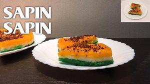 Sapin-sapin is a layered glutinous rice and coconut dessert in filipino cuisine. It is made from rice flour, coconut milk, sugar, water, flavoring and coloring. It is usually sprinkled with latik or toasted desiccated coconut flakes sprinkled on top. #sapinsapin #dessert #foodbookrecipes | LPR Kitchen