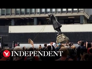 Protesters tear down statue of slave trader