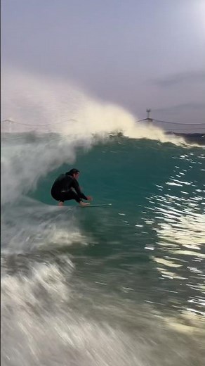 He took a skimboard to the wave pool!