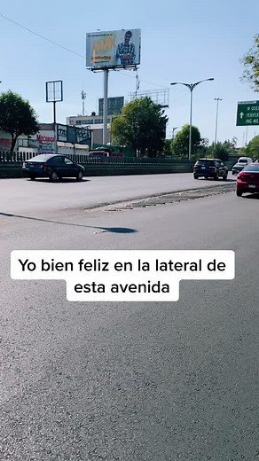 Urban Street Scenes: Cars and Pink Taxi Drive By