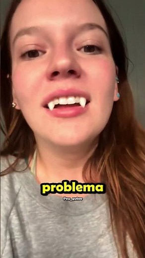 She GLUED on vampire teeth for Halloween! 🎃