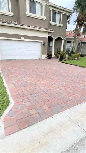 We design more than a garage, we create an entrance that elevates your home’s style. Pavers that combine durability, design, and flawless finishes, built to last and stand out from the very first look. #hardscape #landscape #pavers #landscapedesign #landscaping #hardscaping #patio #outdoordesign #outdoorfurniture #design #florida #outdoorliving #cambridgepavers #sleekpaver | V&M Paverscape
