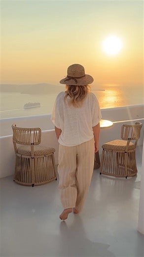 Our Founder Louisa, soaking up the golden afternoon in our best-selling Sadhu Pants, reimagined in airy double cotton gauze. With a relaxed leg, tapered ankle, and breathable crinkle texture, they offer a flattering, feel-good fit that moves with you. Perfect for coastal travel or everyday ease, they bring a touch of luxury to any suitcase or routine. | Nomad the Label