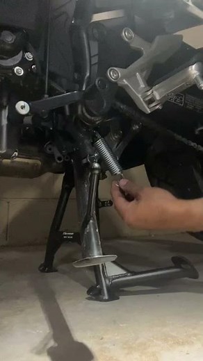 Motorcycle, bike and scooter centre stand or side stand spring installation technique